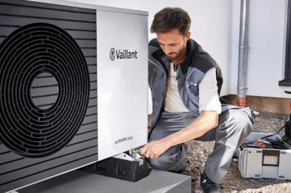Installer working on a heat pump