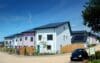 Houses wit solar panels.