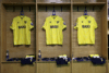 Three football shirts with Baxi branding.