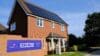 Picture of a residential house with an Octopus Energy Zero Bills sign outside.