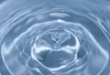 Pool of water with droplet