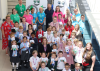 Crowd of schoolchildren and teachers